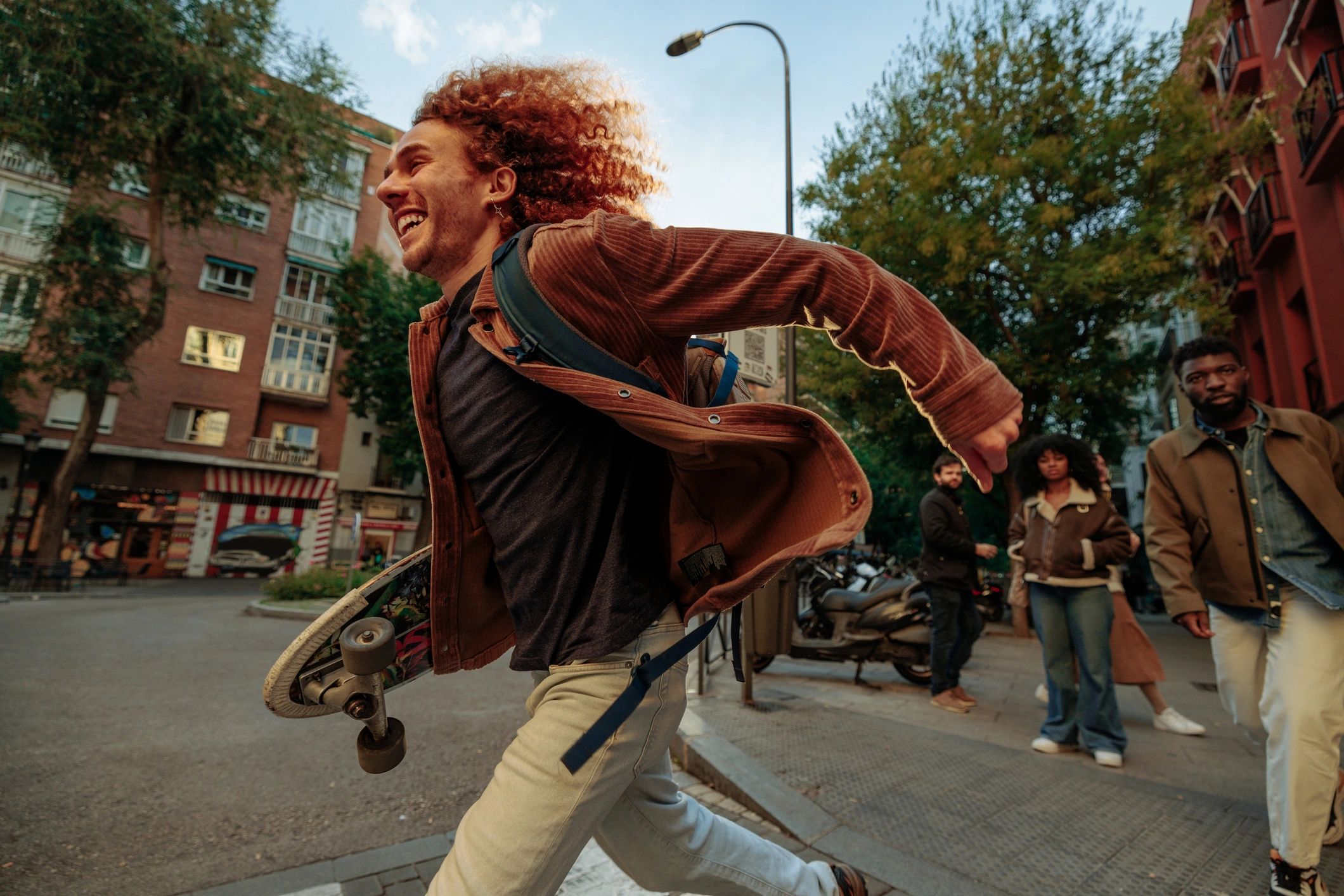 Young creator moving through city streets